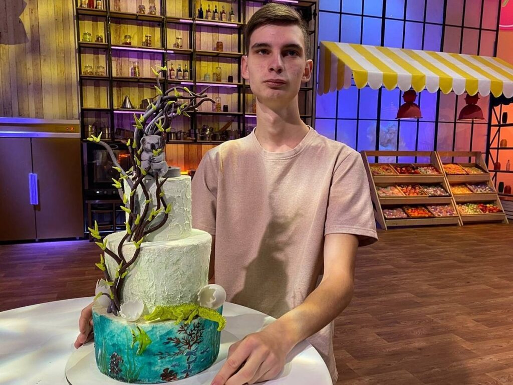 В.